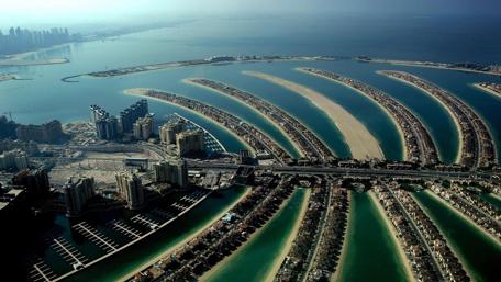 Stunning Aerial View of Dubai's Palm Islands and Skyline wallpaper