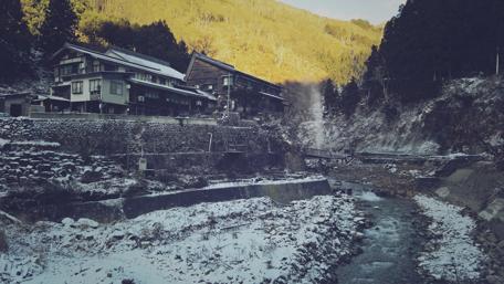 Serene Winter Retreat by the River wallpaper