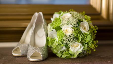 Elegant Wedding Bouquet and Shoes Display wallpaper