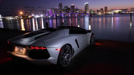Stunning Night View of a Dream Car by the Water wallpaper