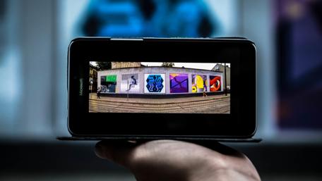 Urban Graffiti Art on Smartphone Display wallpaper