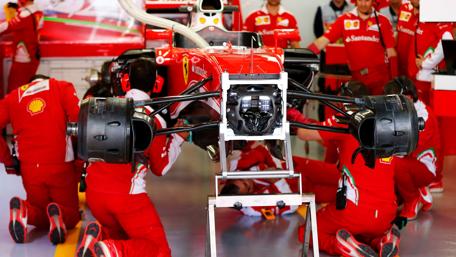 Ferrari Team Mechanics at Work on F1 Car wallpaper