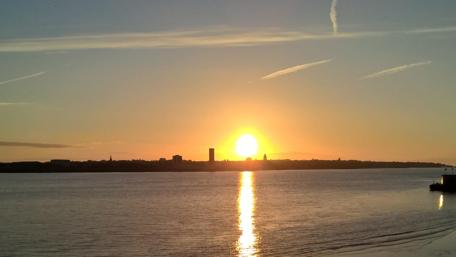 Golden Sunset Over Tranquil Waters wallpaper