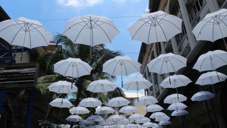 Floating Umbrellas Create a Magical Atmosphere in the Sky wallpaper