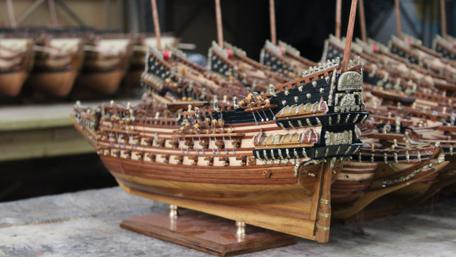 Crafted Wooden Ships in Intricate Detail wallpaper