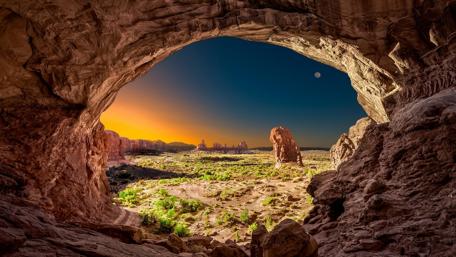 Sunset with the moon at famous Delicate Arch - Arches National Park, Utah wallpaper