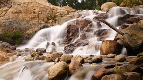 Serene Cascade of Nature's Beauty wallpaper