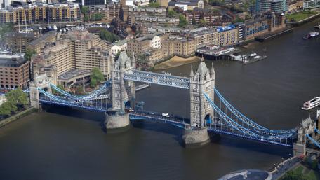 London's Iconic Tower Bridge Over the Thames River wallpaper