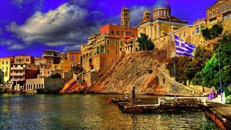 Vibrant Cityscape Under Dynamic Skies wallpaper
