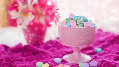 Sweet Treats in a Charming Bowl of Hearts wallpaper