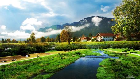 Village by the Serene River wallpaper