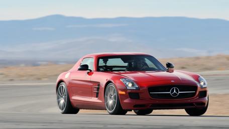 Sleek Red Mercedes SLS AMG in Motion wallpaper