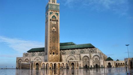 Historic Hasan Mosque in Morocco's Cityscape wallpaper