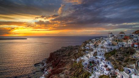 Sunset Over Santorini's Beautiful Coastline wallpaper