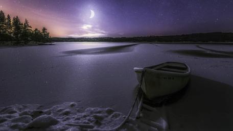 Frozen Serenity Under the Crescent Moon wallpaper