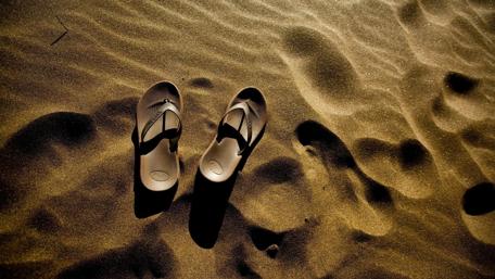 Footprints in the Sand at Sunset wallpaper