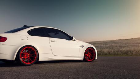 Sleek White Car with Bold Red Accents wallpaper