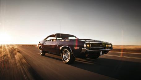 Classic Muscle Car in Motion wallpaper