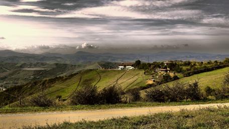 Serene Hills Under Overcast Skies wallpaper