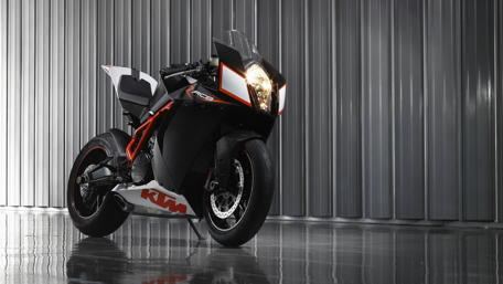 KTM Racing Bike in Modern Garage wallpaper