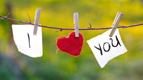 Heartfelt Expression of Love Amidst Nature's Embrace wallpaper