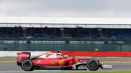 Ferrari F1 Car in Action Racing at Speed wallpaper