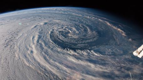 Swirling Storm Over Earth wallpaper