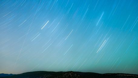 Celestial Dance of Stars in Motion wallpaper