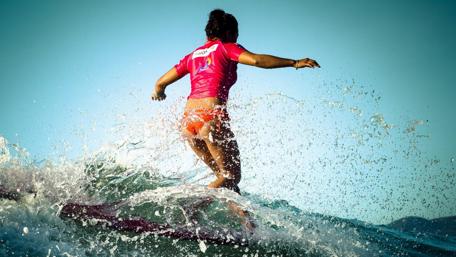 Surfing the Waves with Joy and Freedom wallpaper