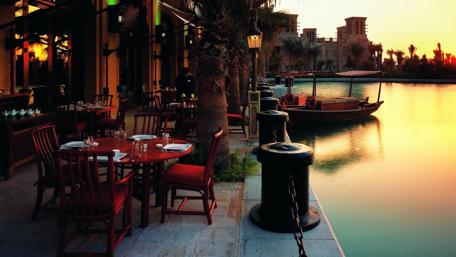 Riverside Cafe Elegance at Sunset wallpaper