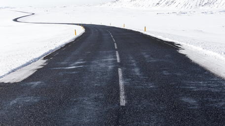 Endless Journey on a Snowy Road wallpaper
