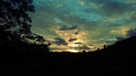 Serene Sunset Over Tranquil Hills wallpaper