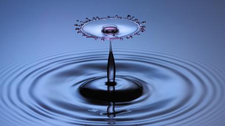Water Drop Symphony in Blue and Purple wallpaper