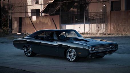 Classic Muscle Car in Urban Setting wallpaper
