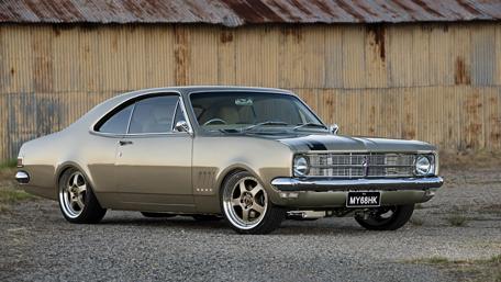 Classic Vintage Car in Rustic Setting wallpaper