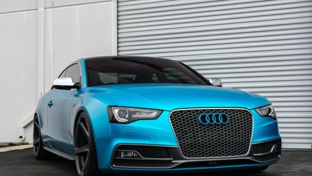 Sleek Blue Audi A5 with Stylish Design wallpaper