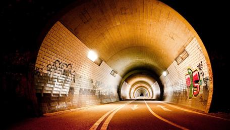 Illuminated Urban Tunnel at Night wallpaper