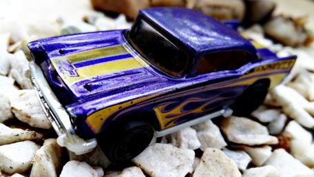 Classic Car Model on Decorative Stones Wallpaper wallpaper