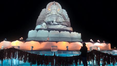 Ethereal Ice Buddha Embracing Serenity wallpaper