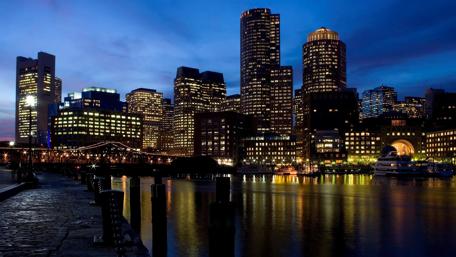 Cityscape at Twilight with Reflections in Water wallpaper