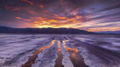 Vibrant Sunset Over Serene Nature Scene wallpaper