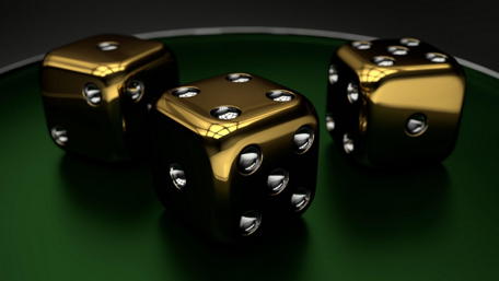 Golden Dice on Green Surface wallpaper