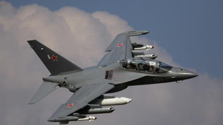 Sleek Jet in Mid-Flight Capture of Power and Precision wallpaper
