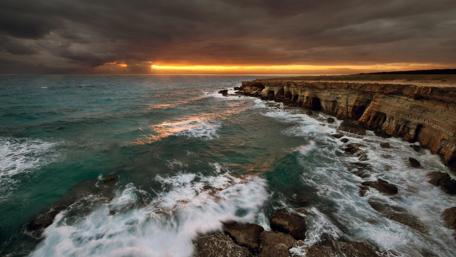 Stormy Seas at Sunset Coastline wallpaper