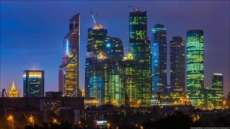 Stunning Cityscape at Night with Towering Skyscrapers wallpaper