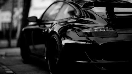 Sleek Black Car in Monochrome Style wallpaper