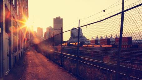 Urban Sunrise Over City Tracks wallpaper