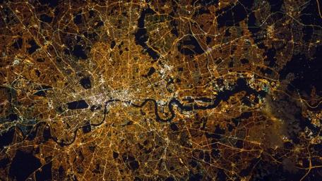 Illuminated Cityscape at Night Worldview wallpaper