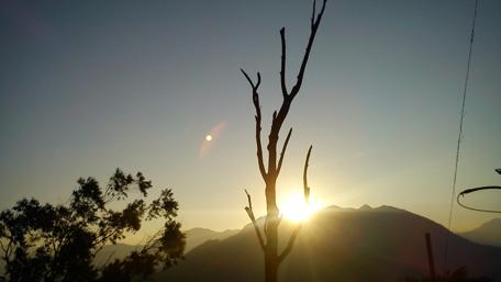 Majestic Sunrise Over Ponmudi Hills wallpaper