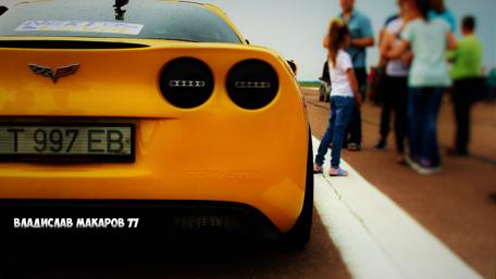 Vibrant Yellow Corvette in Cherkassy Scene wallpaper